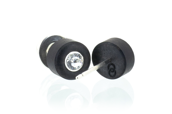 Round wood earrings set with Swarovski CZ. Made in Ebony wood. View of logo on back. 