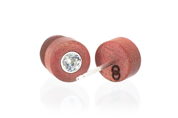 Wood earrings set with Swarovski CZ. Made in Pink Ivory wood. View of back logo.