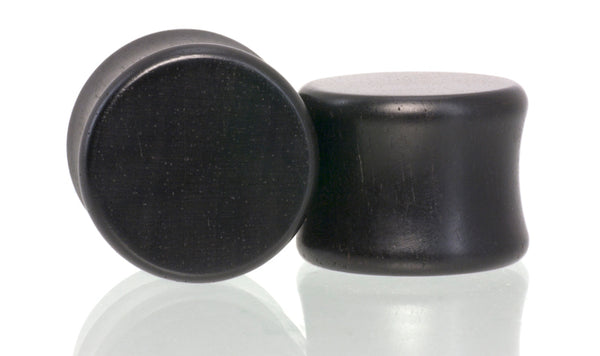 Ear gauge plugs made in Ebony wood. 