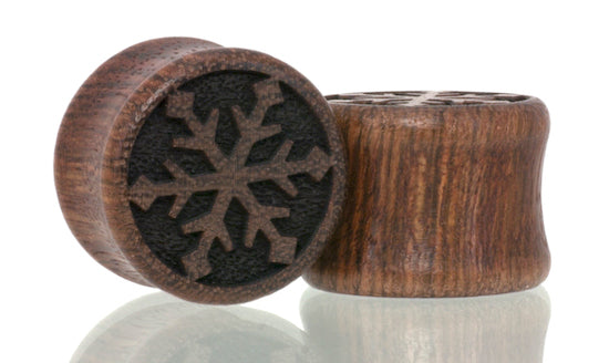 Ear gauge plugs in Chechen wood with Snowflake etched graphic. 