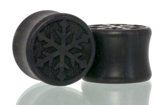 Ear gauge plugs in Ebony wood with Snowflake etched graphic. 
