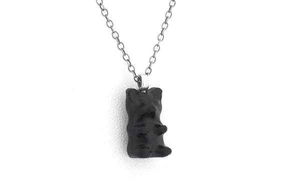 Bear pendant. Ebony wood pendant with sterling silver bail.