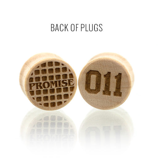 Ear gauge plugs made in Maple wood with Promise Waffle and 011 etched graphics. 